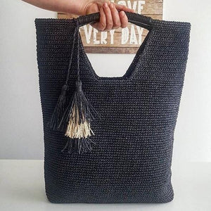 black crochet bag with tassel