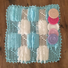Load image into Gallery viewer, light blue and white square shaped exfoliating bath cloth with tassels and pink purple white round face scrubbies
