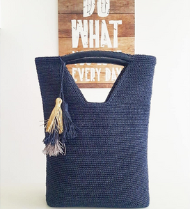 blue crochet bag with tassel