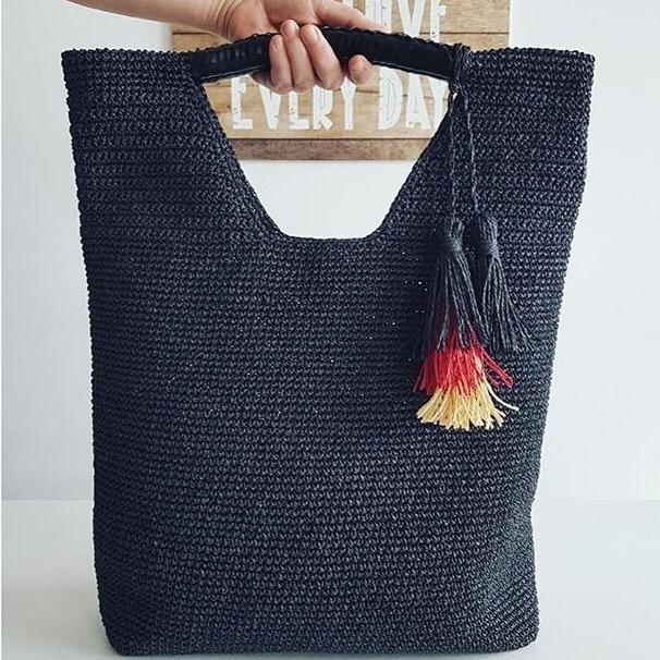 black crochet bag red tassel yellow tassel